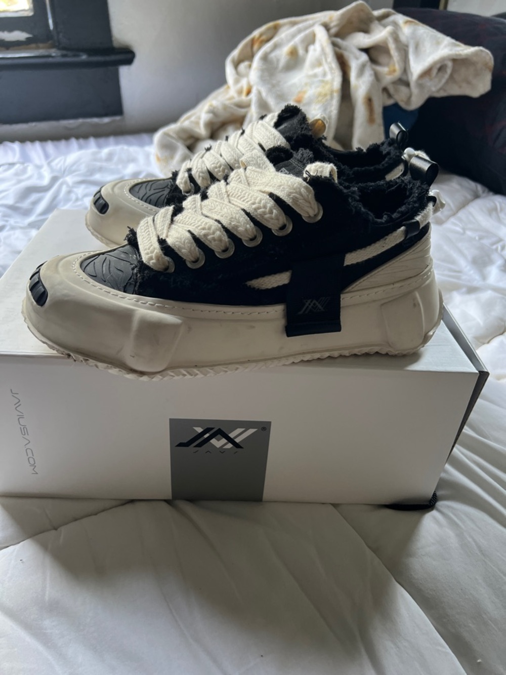JAVJUS Black and Cream Low-Top Sneakers